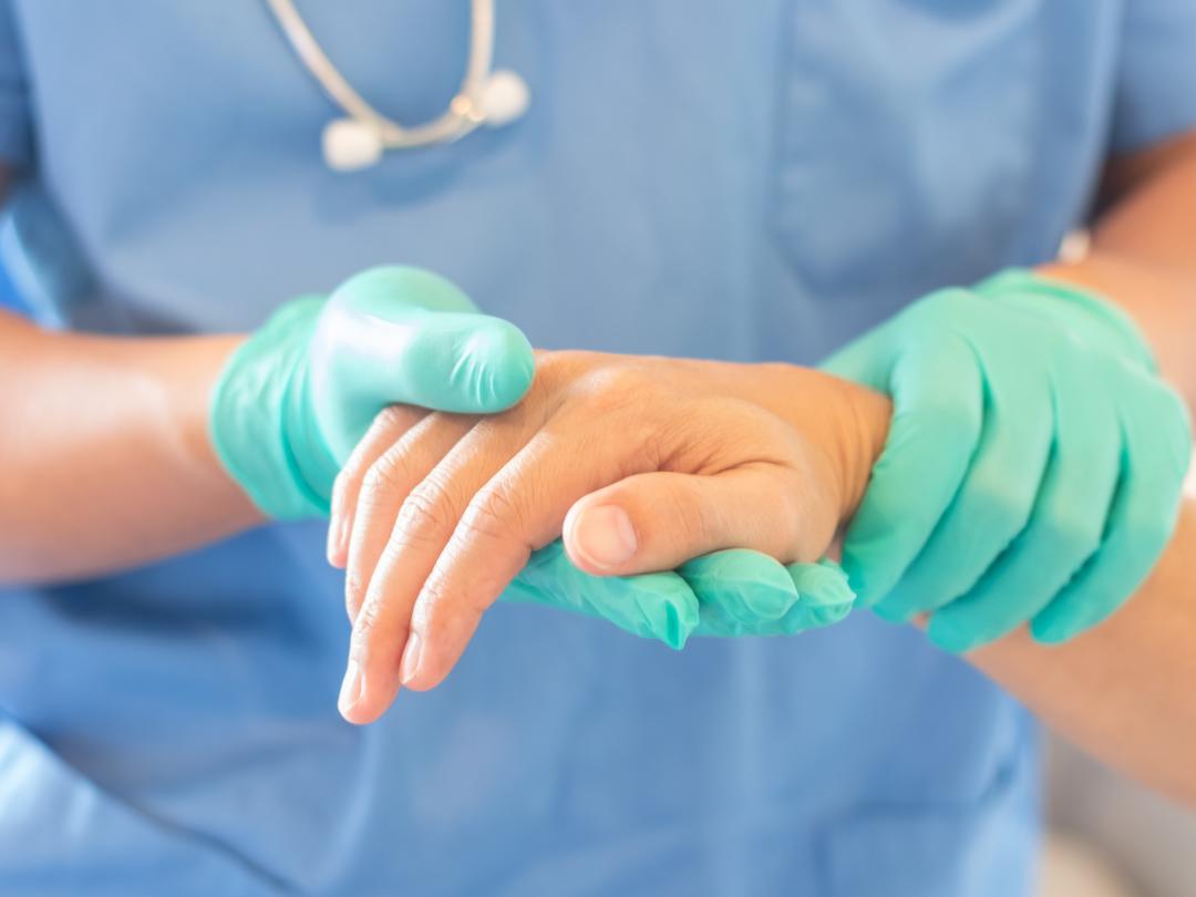Nurse Holding Patients Hand
